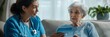 © vefimov - An elderly patient is being comforted by a nurse in her hospital room