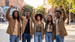 © Eduardo Accorinti - Group of young african american activists with raised fists in the street