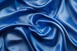 © mehaniq41 - Luxurious blue silky fabric with gentle waves and soft folds under diffused light creates serene texture. Neural network AI generated