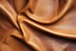 © mehaniq41 - Close-up of brown leather fabric with swirling folds, showcasing rich texture and sheen under warm lighting. Detailed surface and luxury in appearance. Neural network AI generated
