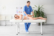 © Pixel-Shot - Young woman getting anti-cellulite massage with tool in clinic