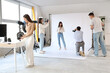 © Pixel-Shot - Photographers taking pictures of model during master class in studio