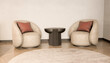 © Westend61 - Modern office lounge with sofa chair and round side table 3d render