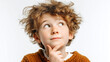 © Art of Ngu - Curious young boy with messy curly hair thinking and looking up, isolated on white background, playful expression