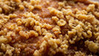 © Nurbaiti - Close-up of crumble topping on sweet dessert