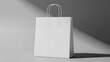 © Nanang - Minimalist White Paper Bag Mockup for Modern Retail Branding