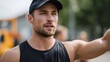 © Thares2020 - Focused athletic man in sportswear outdoors on a bright sunny day appearing to lead or instruct