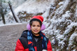 © Antonio Recena - Caucasian Child Aged Ten Wearing Earmuffs and Hat Looking at Camera on a Winter Day