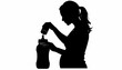 © arinda_BJ - Silhouette of a pregnant woman preparing a baby bottle with formula.