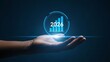 © Sabeda - Hand holding glowing blue 2026 year bar chart graph future growth