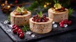Three round portions of food sit on a dark plate. Each has different toppings and garnishes. Surrounding the food are decorative elements creating a festive look for a holiday event.