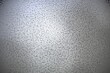 © MikanStock - Detailed silver metallic hammered texture background for industrial and sleek designs