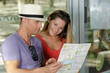 © auremar - tourist couple with map looking for a way