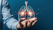 © Arsal Stock - Doctor or scientist presenting a glowing holographic human lung organ model floating above an open hand against a dark blue background symbolizing respiratory health innovation