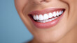 ©  TOFEL - A radiant close up of a woman displaying a beautiful healthy and bright smile