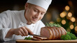 © Edhar - Young chef slicing roasted meat on wooden board restaurant cuisine hospitality and gourmet dinner concept
