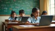 © Pete - Indian students in uniform work on laptops in classroom setting. Children learn digital skills in front of green chalkboard with drawings. School education is modernizing.