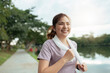 © itchaznong - Women runner wearing sport cloths jogging in morning at park. Active morning