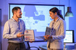 © Pixel-Shot - Young business analysts working in office. Data science concept