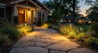 © aryanaditiro - Beautifully lit stone pathway leading to a cozy modern home at dusk.