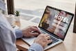 © Song_about_summer - booking hotel online, travel planning website, internet reservation concept, man looking at screen of computer searching accommodation for tourism