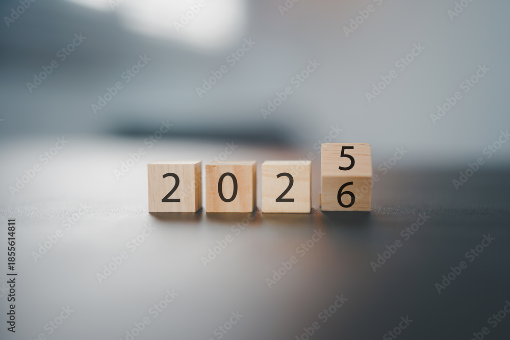 Transitioning from 2025 to 2026 with wooden blocks symbolizing target ...