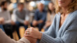 © Julia - Faceless men and women sitting in circle during group therapy, supporting each other, mental health community session, defocused participants, with copy space