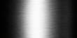 © PAGLAA - A polished stainless steel plate with a brushed metal texture creates a shiny silver metallic surface featuring a grey industrial aluminum pattern and a titanium alloy reflection material