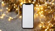 © Fiverr/fazilazia703 - Modern mobile phone mockup with blank white screen presentation, centered on a gray stone texture background with sparkling golden Christmas lights and elegant bokeh for holiday app promotion.