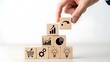 © Najmin - Business strategy and growth concept with wooden blocks and icons on white background