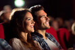 © Photoenthusiast82 - Couple watching a ln action movie in a movie crowded theater