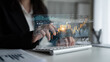 © InfiniteFlow - A businesswoman engages with financial data on her computer, displaying digital graphs and charts in a modern office environment, showcasing professional analysis. Scalp