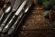 © john - Cutlery set on wooden table, top view with space for text. Christmas celebration