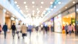 © Desmon - Blurred image of shoppers strolling through a brightly lit, modern shopping mall