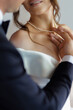 © Kantemir Production - Gown adornment moment, Elegant jewelry exchange before ceremony