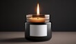 © Daryl - burning candle in a black jar with a blank label