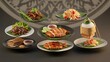 ©  Stock Picture - A delicious spread of Thai dishes featuring grilled chicken, salad, and rice, perfect for a traditional meal