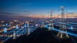 © Anusa - High voltage power transmission towers illuminating urban landscape at dusk electric infrastructure city view energy efficiency