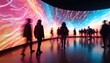 © Maryna - People walk through immersive art installation. Large curved screen shows vibrant abstract motion graphics. Visitors observe colorful digital display in modern gallery space.