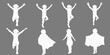 © Debashis - Silhouettes of children jumping and posing with arms raised in the air
