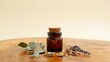 © Ksenia - Rustic studio still life of traditional balm on wooden table with apothecary bottle and herbs