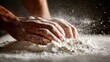 © fivan - Close-up of hands brushing excess flour away