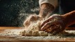 © fivan - Close-up of hands brushing excess flour away