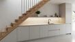 © Tukijo - Contemporary kitchen design featuring staircase and minimalist cabinetry