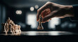 © laraib - Strategic hand moves chess piece on board, symbolizing decision and competition