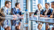 © ahsan - A clear plastic water bottle on a conference table in a modern office
