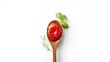 © AkuAku - Fresh tomato paste resting on a wooden spoon highlighting natural ingredients, ideal for food production environments