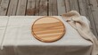 © TheWaterMeloonProjec - Unoccupied pizza serving board on deck with a cloth table covering, used for casual outdoor meals