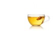 © ArtificialHorizons - Herbal tea served in a transparent glass cup against a white backdrop, ideal for editorial use or product display