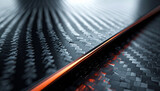 Carbon Fiber Texture with Bright Line: A close-up view reveals the intricate weave of a carbon fiber texture, intersected by a vibrant, glowing line. The image evokes a sense of modern technology.